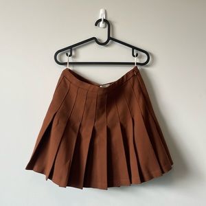 Pleated skirt, length is above knees, lined. Never worn.